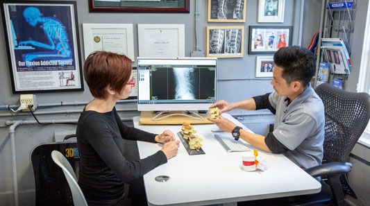 Image of Dr. Chau Providing Consultation